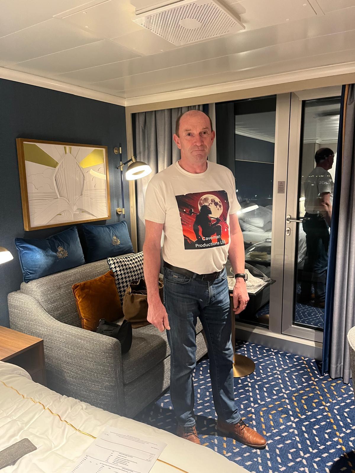 Ray wearing Caveman Tee