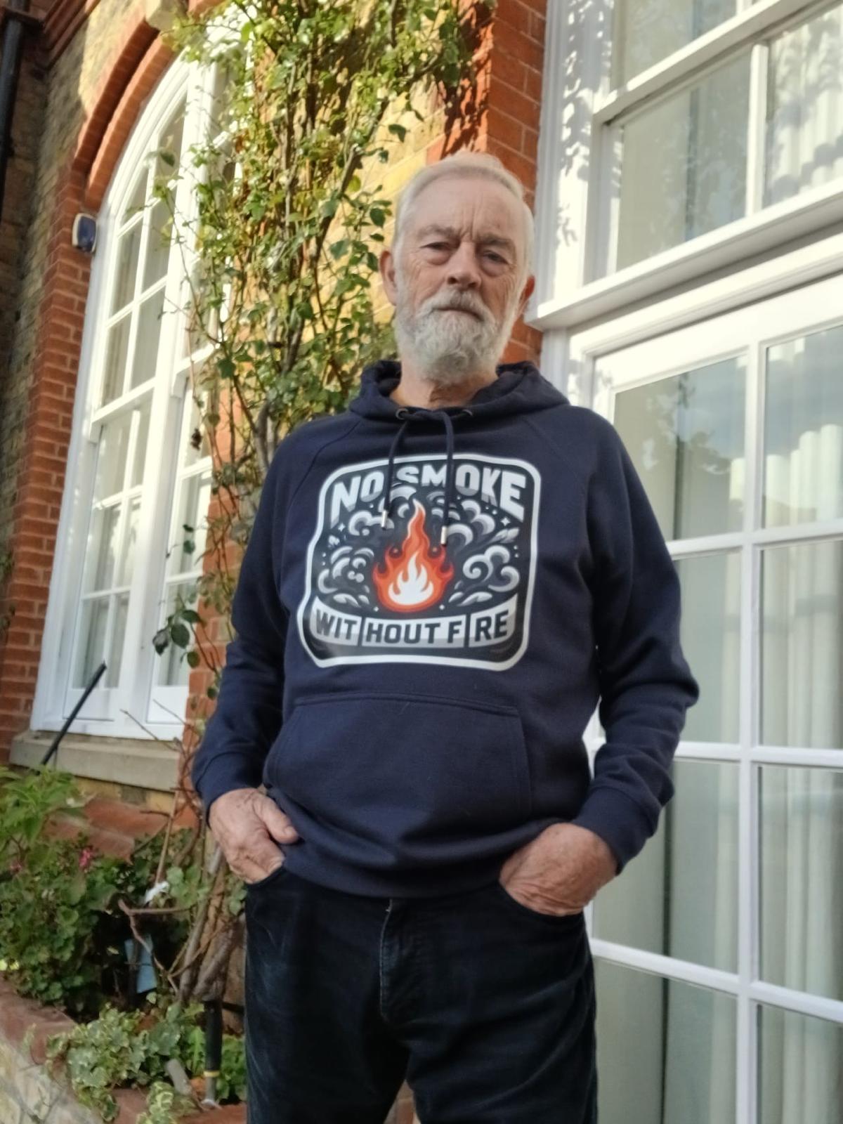 Steve wearing Caveman Tee