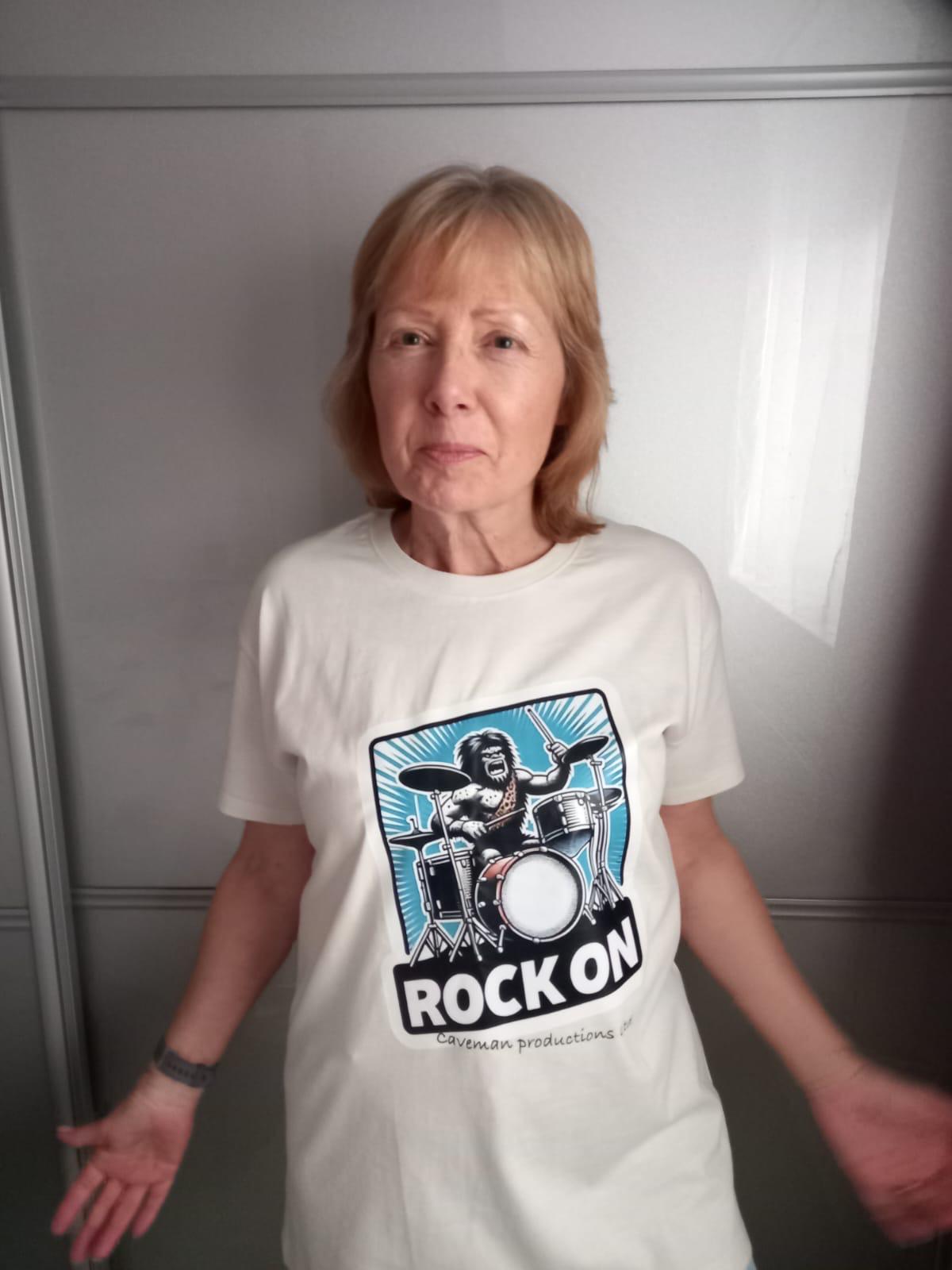 Sue wearing Caveman Tee
